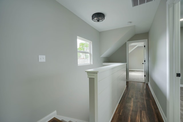 324 E Mound St, Circleville, OH 43113 - corridor with baseboards, an upstairs landing, visible vents, and dark wood-style floors