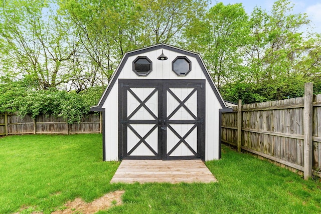 view of shed featuring a fenced backyard