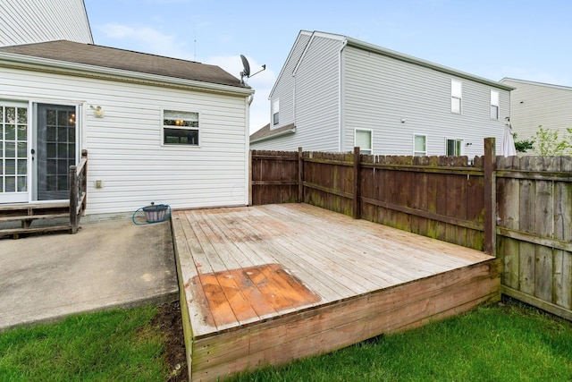 wooden deck featuring fence