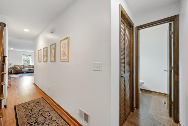 4216 Chaucer Ln, Columbus, OH 43220 - hall with visible vents, wood finished floors, and recessed lighting