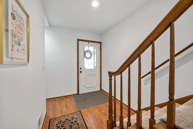4216 Chaucer Ln, Columbus, OH 43220 - foyer with stairs, wood finished floors, visible vents, recessed lighting, and baseboards
