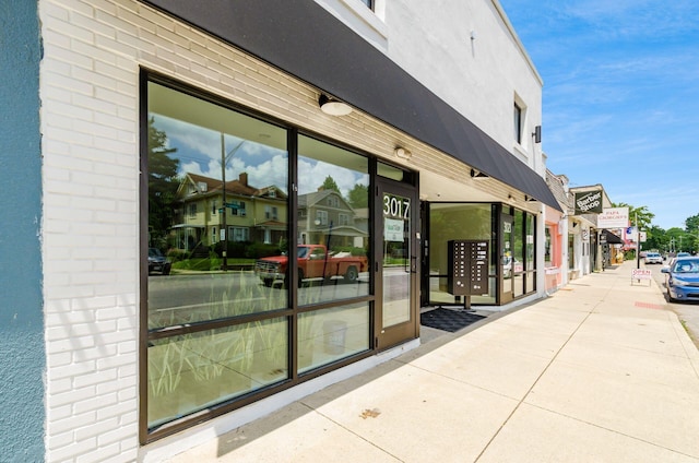 property entrance featuring stucco siding