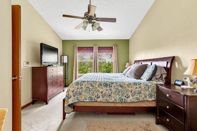 carpeted bedroom with a ceiling fan and baseboards