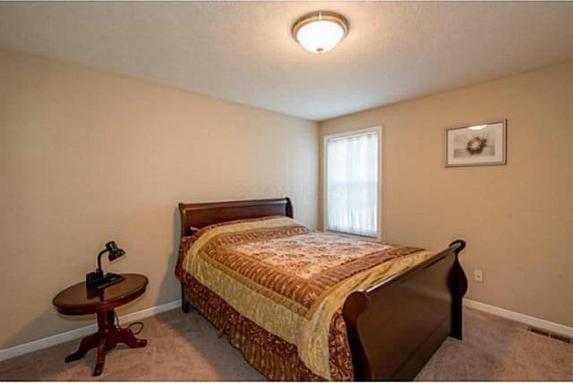 1139 Cross Creeks Rdg, Pickerington, OH 43147 - bedroom with carpet and baseboards