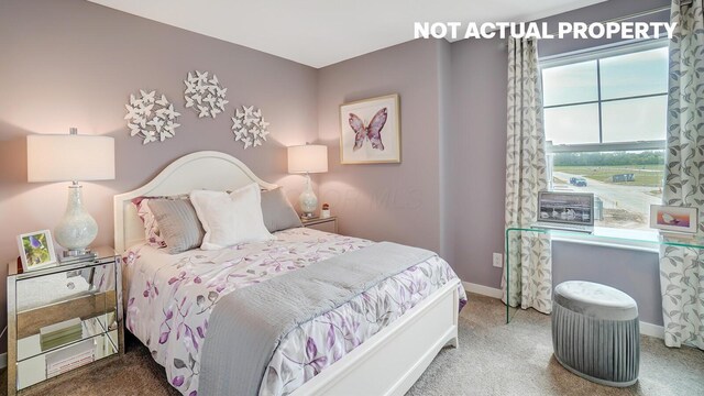 6360 Ripken St, Columbus, OH 43228 - carpeted bedroom featuring baseboards