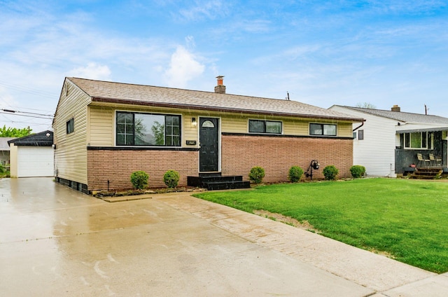 ranch-style house featuring an outdoor structure, brick siding, a garage, a front lawn, and a chimney