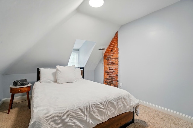 931 Dennison Ave, Columbus, OH 43201 - bedroom with lofted ceiling, carpet flooring, and baseboards