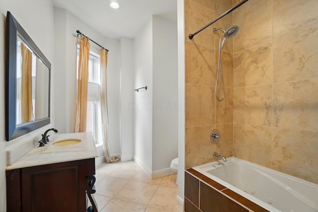 931 Dennison Ave, Columbus, OH 43201 - bathroom with toilet, shower / bathtub combination, vanity, tile patterned floors, and baseboards