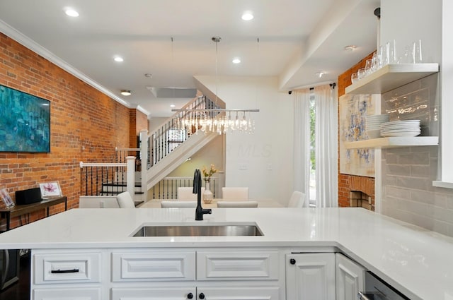 931 Dennison Ave, Columbus, OH 43201 - kitchen with a sink, open shelves, and brick wall