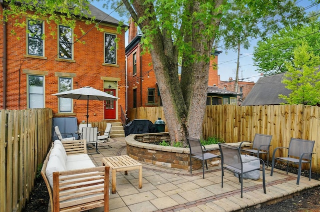 931 Dennison Ave, Columbus, OH 43201 - view of patio / terrace featuring a fenced backyard and an outdoor hangout area