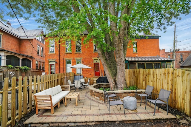 931 Dennison Ave, Columbus, OH 43201 - view of patio with outdoor lounge area and a fenced backyard