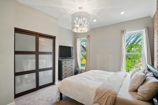 931 Dennison Ave, Columbus, OH 43201 - carpeted bedroom featuring recessed lighting, multiple windows, and a notable chandelier