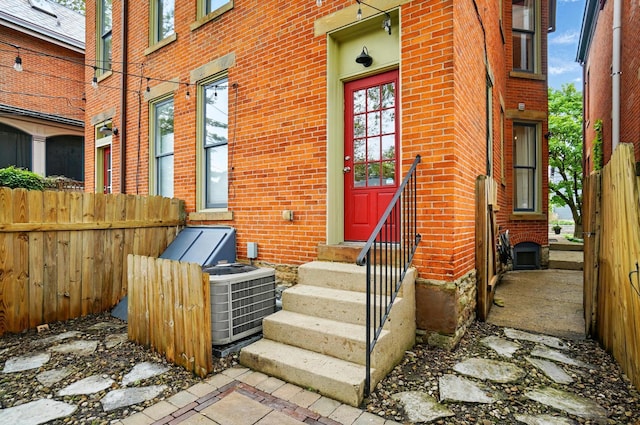 931 Dennison Ave, Columbus, OH 43201 - doorway to property with brick siding and fence