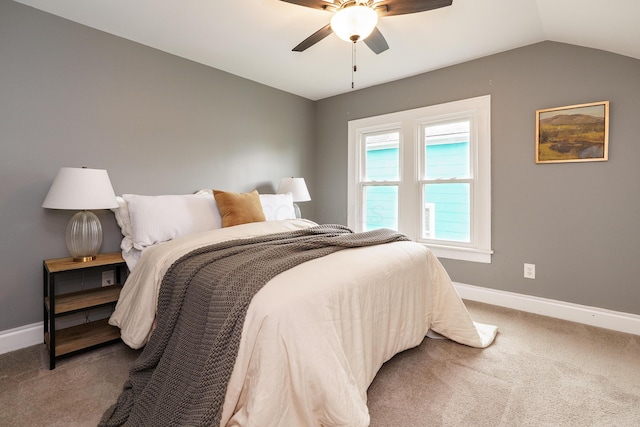 24 Brighton Rd, Columbus, OH 43202 - bedroom with baseboards, carpet floors, vaulted ceiling, and a ceiling fan