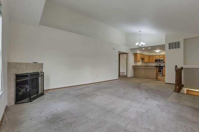 6010 Acropolis Way, Columbus, OH 43231 - unfurnished living room featuring a chandelier, light carpet, vaulted ceiling, baseboards, and a fireplace