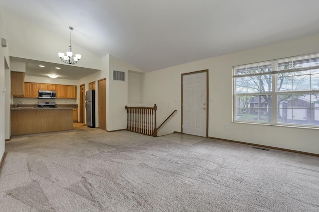 6010 Acropolis Way, Columbus, OH 43231 - unfurnished living room featuring a chandelier, lofted ceiling, light carpet, a sink, and baseboards