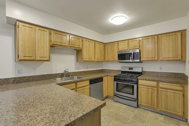 6010 Acropolis Way, Columbus, OH 43231 - kitchen with stainless steel appliances, a sink, and dark countertops