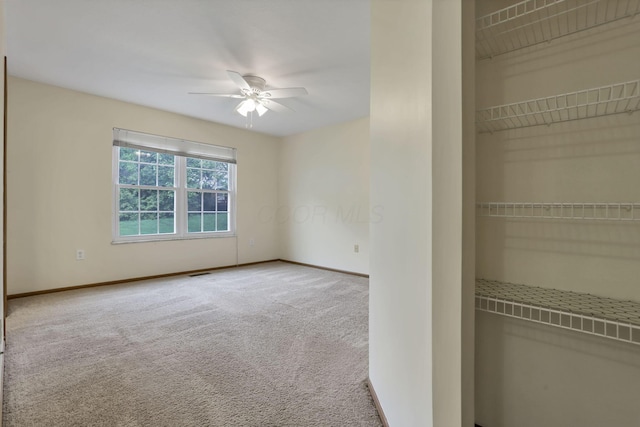 6010 Acropolis Way, Columbus, OH 43231 - unfurnished bedroom featuring carpet flooring, baseboards, and a ceiling fan