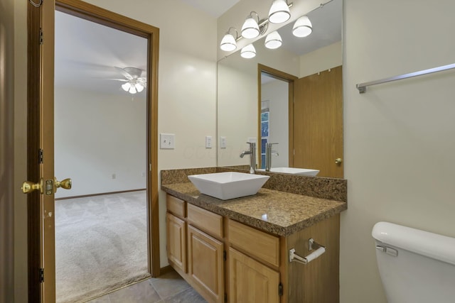 6010 Acropolis Way, Columbus, OH 43231 - half bathroom featuring vanity, toilet, and ceiling fan