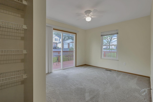 6010 Acropolis Way, Columbus, OH 43231 - unfurnished room featuring ceiling fan, plenty of natural light, carpet flooring, and baseboards