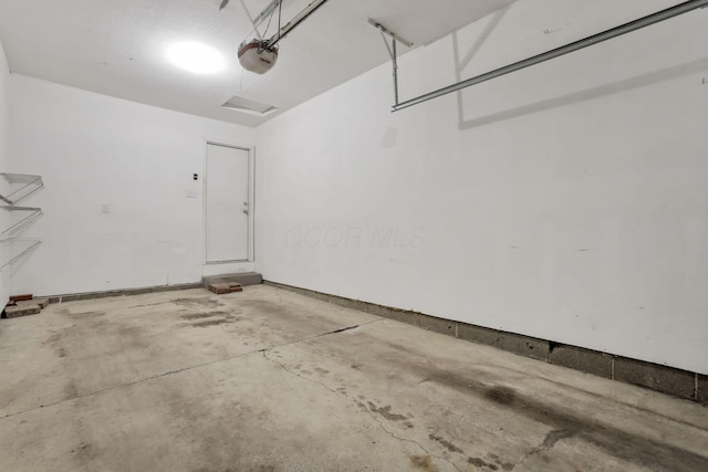 6010 Acropolis Way, Columbus, OH 43231 - garage featuring a garage door opener