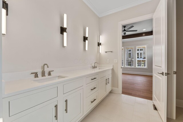 1473 Dogwood Loop, Powell, OH 43065 - full bath featuring crown molding, ceiling fan, double vanity, and baseboards