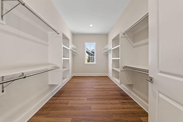 1473 Dogwood Loop, Powell, OH 43065 - spacious closet featuring dark wood-type flooring