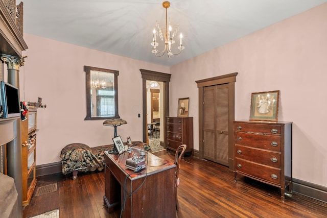 1205 Bryden Rd Unit 7, Columbus, OH 43205 - office area featuring dark wood-style flooring, a chandelier, and baseboards