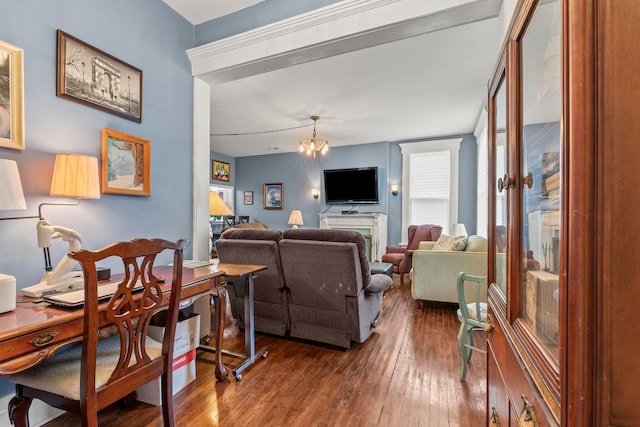 1205 Bryden Rd Unit 7, Columbus, OH 43205 - living area featuring wood-type flooring, a chandelier, and an office area