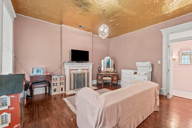 1205 Bryden Rd Unit 7, Columbus, OH 43205 - living room featuring hardwood / wood-style flooring, baseboards, and a fireplace with raised hearth