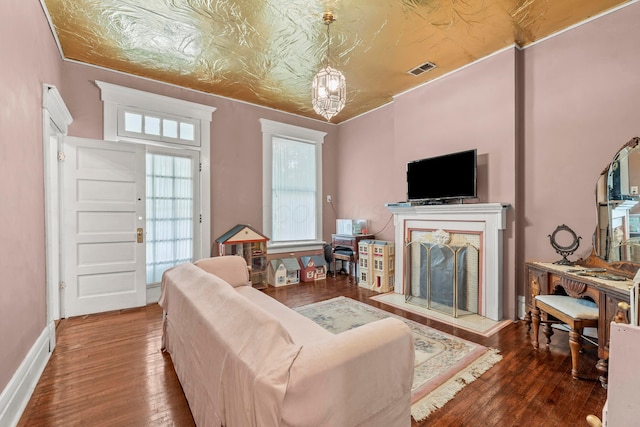 1205 Bryden Rd Unit 7, Columbus, OH 43205 - living room featuring a fireplace, hardwood / wood-style floors, and baseboards