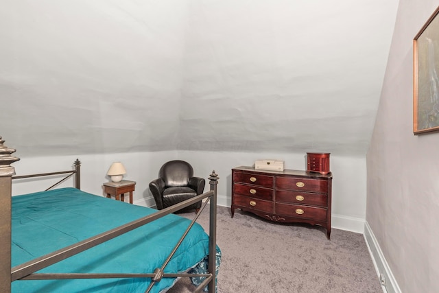 1205 Bryden Rd Unit 7, Columbus, OH 43205 - bedroom with lofted ceiling, carpet, and baseboards