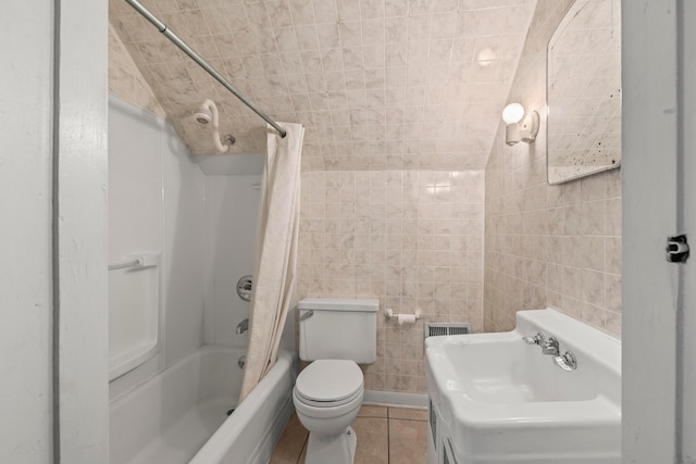 1205 Bryden Rd Unit 7, Columbus, OH 43205 - bathroom with a sink, shower / bath combo, toilet, tile walls, and tile patterned floors