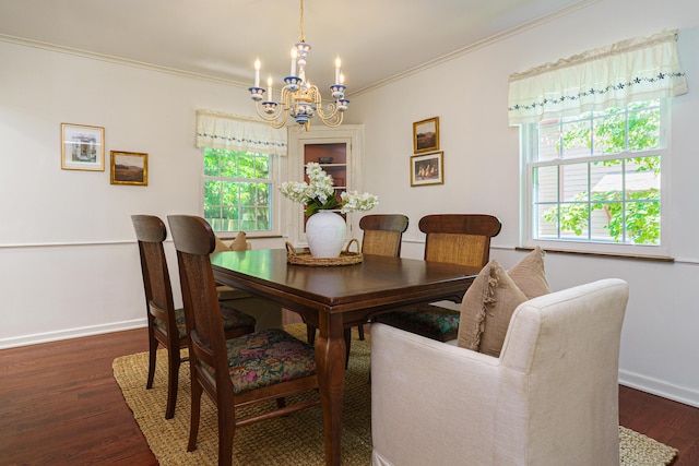 1660 Ridgeway Pl, Columbus, OH 43212 - dining area featuring a chandelier, ornamental molding, and dark wood-style flooring