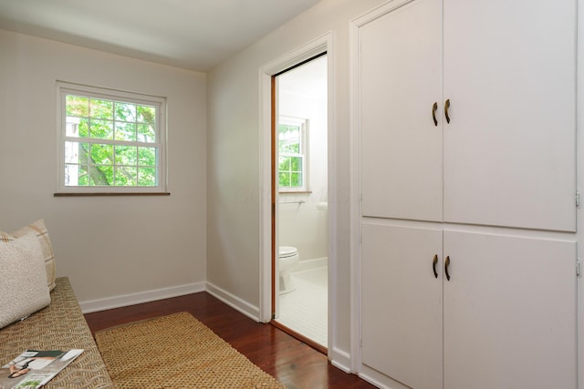 1660 Ridgeway Pl, Columbus, OH 43212 - bedroom featuring dark wood-type flooring, multiple windows, and ensuite bath