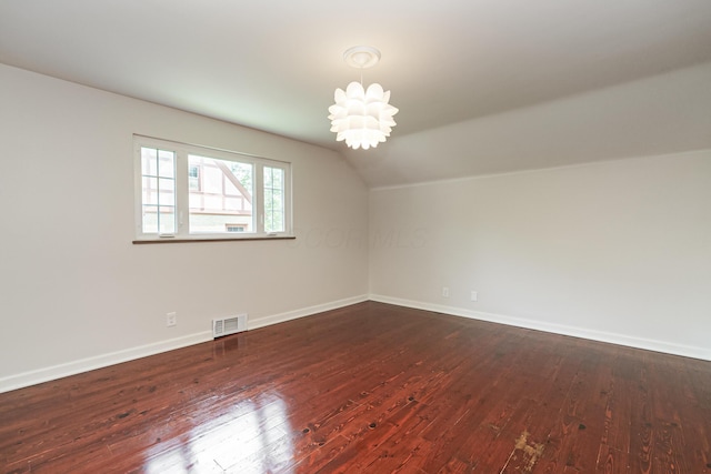 1660 Ridgeway Pl, Columbus, OH 43212 - bonus room featuring vaulted ceiling and dark wood finished floors