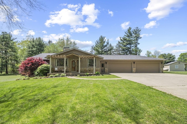 2825 Kings Corners Rd E, Mansfield, OH 44904 - view of front facade featuring stone siding, an attached garage, driveway, and a front yard