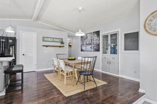 2825 Kings Corners Rd E, Mansfield, OH 44904 - dining area with baseboards and dark wood-type flooring