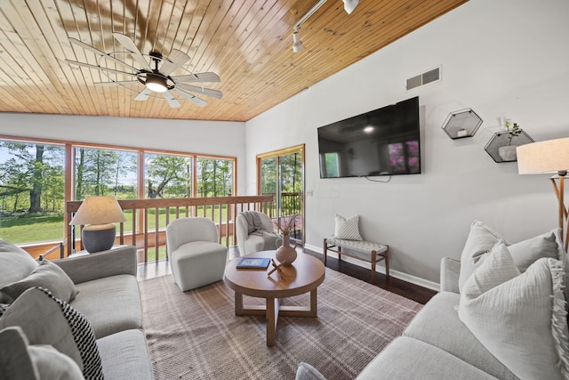 2825 Kings Corners Rd E, Mansfield, OH 44904 - living room featuring vaulted ceiling, wooden ceiling, baseboards, a ceiling fan, and wood finished floors