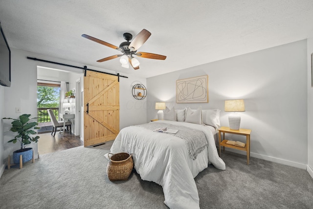 2825 Kings Corners Rd E, Mansfield, OH 44904 - bedroom with a barn door, baseboards, access to exterior, and ceiling fan
