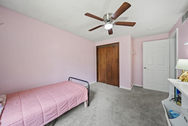 2825 Kings Corners Rd E, Mansfield, OH 44904 - bedroom featuring carpet, a closet, a ceiling fan, and baseboards