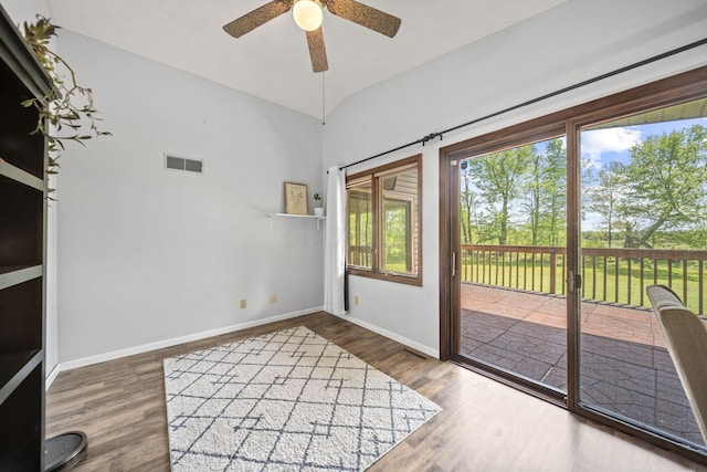 2825 Kings Corners Rd E, Mansfield, OH 44904 - doorway to outside with a ceiling fan, plenty of natural light, wood finished floors, and baseboards