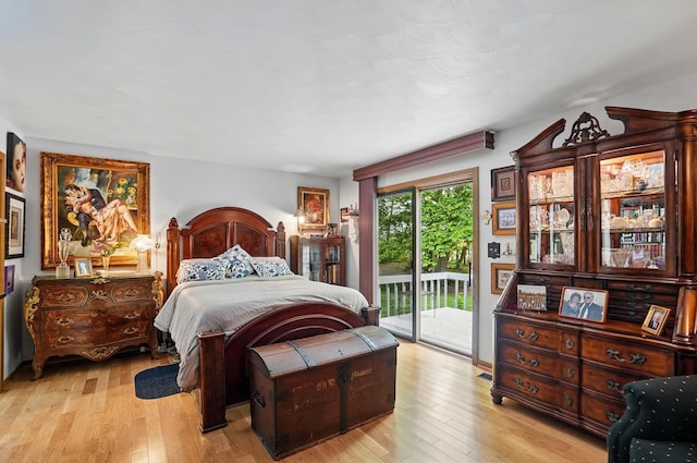 8292 Breckenridge Way, Columbus, OH 43235 - bedroom featuring access to outside and light wood-style flooring