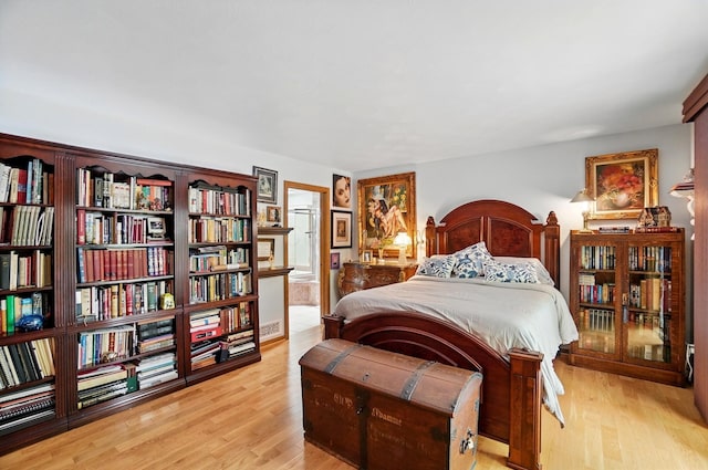8292 Breckenridge Way, Columbus, OH 43235 - bedroom with light wood finished floors and ensuite bath