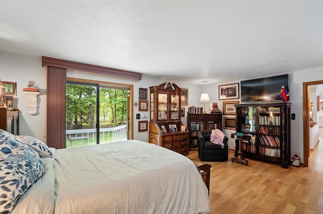 8292 Breckenridge Way, Columbus, OH 43235 - bedroom with access to outside and light wood-style flooring