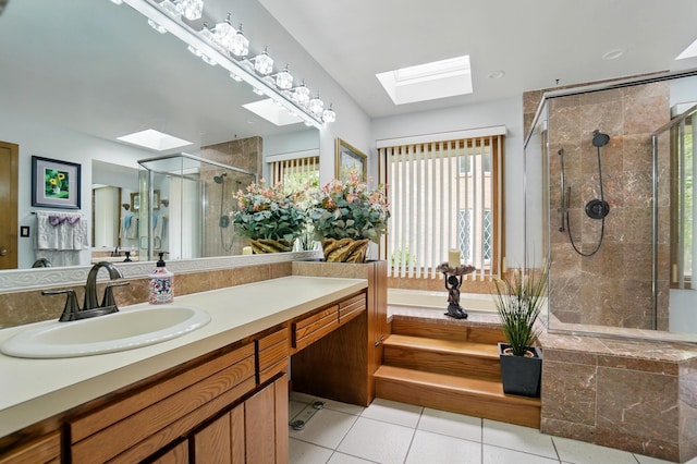 8292 Breckenridge Way, Columbus, OH 43235 - bathroom with a skylight, vanity, a stall shower, and tile patterned flooring