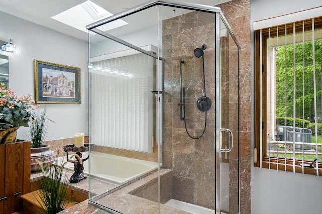 8292 Breckenridge Way, Columbus, OH 43235 - full bathroom featuring a skylight, a garden tub, and a shower stall