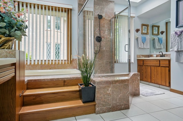 8292 Breckenridge Way, Columbus, OH 43235 - bathroom featuring vanity, a stall shower, a bath, and tile patterned flooring