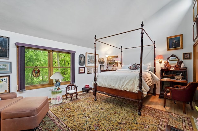 8292 Breckenridge Way, Columbus, OH 43235 - bedroom featuring wood finished floors and lofted ceiling