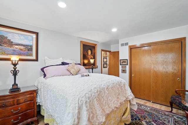 8292 Breckenridge Way, Columbus, OH 43235 - bedroom with a closet, light wood-style flooring, and recessed lighting